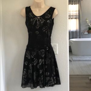 Black shiny midi dress.